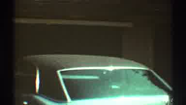 Los Angeles California (1969): A Vintage Car In A Garage On A Lovely Sunny Day