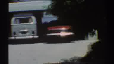 Los Angeles California (1969): Light Blue Van Parked In Garage Of A White House On