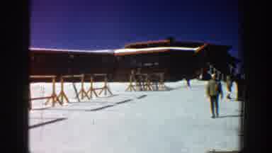 Aspen Colorado (1961): Group Of People Walking Skiing On Ski Resort With Snow