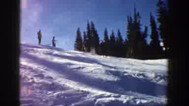 Aspen Colorado (1961): Sportsmen Having Fun Skiing On An Icy Field One By One