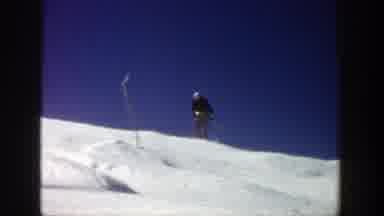 Aspen Colorado (1961): Proud Skier Comes Over The Top Of Hill Top Proud To Show