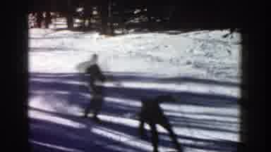 Aspen Colorado (1961): Group Of Skiers Slide Down A Mountain While One Almost