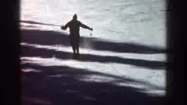 Aspen Colorado (1961): Man Skiing Down Snow-Covered Mountain And Trees In The