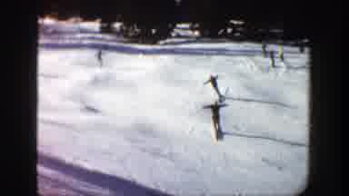 Aspen Colorado (1961): Skiers King Down A Snow Covered Hill With A Clip Of A