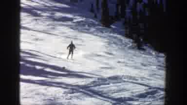 Aspen Colorado (1961): Person Wearing Blue Hat Skis Downhill On A Bright Sunny Day
