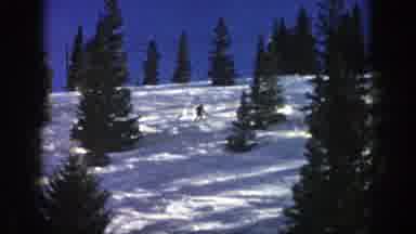 Aspen Colorado (1961): Person Skiing On Snow-Covered Mountain Dodging Trees