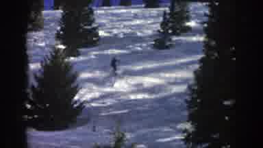 Aspen Colorado (1961): Man Skis Down Snowy Mountains Showing No Fear And At A High
