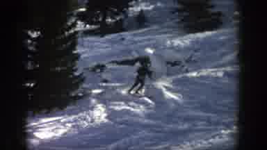 Aspen Colorado (1961): The Skier Makes Quick Turns Down Forested Area On Mountain