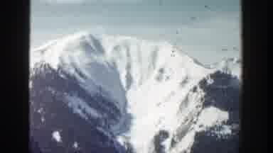 Aspen Colorado (1961): View Of Snow Covered Mountain And Blue Sky On A Sunny Day
