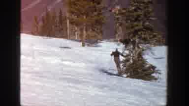 Aspen Colorado (1961): Two Men Skiing On A Snowy Mountain Through Pine Trees