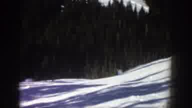 Aspen Colorado (1961): Cross Country Skiers Ski On A Snow Covered Slope Into A