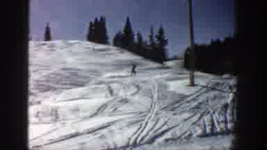 Aspen Colorado (1961): View Of Person Falling While Skiing Downhill On A Bright