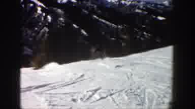 Aspen Colorado (1961): Person Skis Down Mountain Slope And Out Of Camera View On