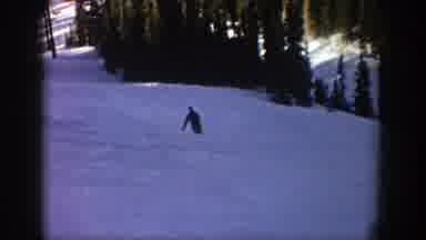 Aspen Colorado (1961): Person Skiing Around In Shady Area Of Slope Trees And Sunny