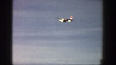 Aspen Colorado (1961): Camera Focuses On Plane Flying Through Sky White Plane With