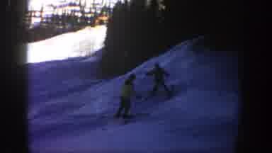 Aspen Colorado (1961): Two Men Skiing And One Of Them Falls Down