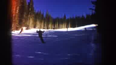 Aspen Colorado (1961): An Adult Skiing Followed By Others Skiing Downhill On Snow