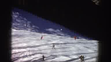 Aspen Colorado (1961): Several People Are Enjoying The Day Skiing Down The