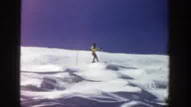 Aspen Colorado (1961): Person Skiing Down Slope With Many Small Hills Of Snow To