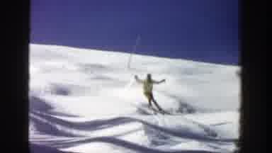 Aspen Colorado (1961): Adult Skiing Downhill Making Short Turns Over Small Hills