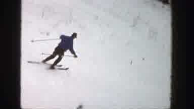 Aspen Colorado (1961): A Person On Skis That Is Skiing Down A Snowy Mountain Trail