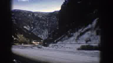 Aspen Colorado (1961): Snow Covered Canyon With A River Videoed From A Moving