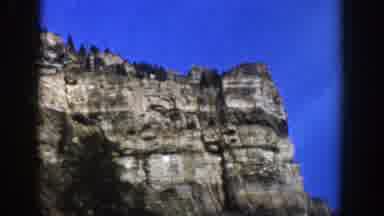 Aspen Colorado (1961): Massive Mountainous Cliffs With Snow And Trees