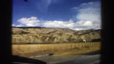 Aspen Colorado (1961): Car Traveling On A Road Around A Nature