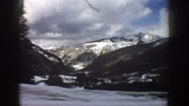 Aspen Colorado (1961): A Scenic Drive Along A Mountain Road In The Winter