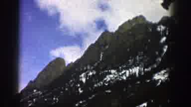 Aspen Colorado (1961): Mountain Forest Blue Sky White Clouds