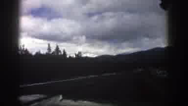 Aspen Colorado (1961): Moving Car And Mountains