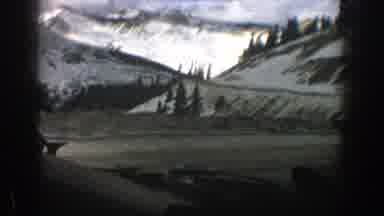 Aspen Colorado (1961): Vehicle Moves Along Road In Mountainous Region Snow Covered