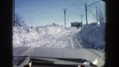 Aspen Colorado (1961): Man Films Himself Driving Down A Snow Covered Road After