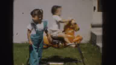 California (1952): Young Cute Kid Riding His Stationary Horse Toy