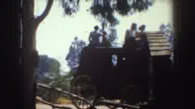 California (1952): Four People Riding On Top Of Stagecoach On A Clear Day