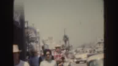 California (1952): People Walking Through A Busy Street
