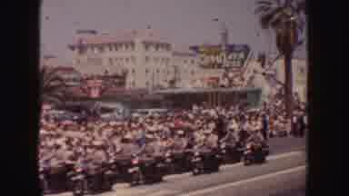 California (1952): Crowd Watches On As A Motorcade Drive Through A Parade