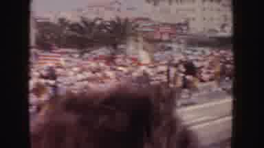 California (1952): Parade With Men Riding Horses Carrying Flags Of Different