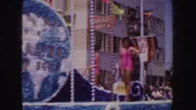 California (1952): A Parade Showing Ladies On A Parade Float Waving On A Sunny Day