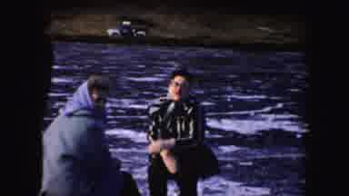 Idaho (1955): Three People Skating On Frozen Lake On A Clear Day