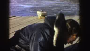 Idaho (1955): Man Gutting A Fish With Kids Ice Skating