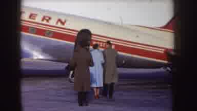 Idaho (1955): Passengers Walk Toward The Door Of A Western DC- Airliner Painted