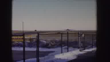 Idaho (1955): Beautiful View Of A Snowy Runway During An Aircraft Landing