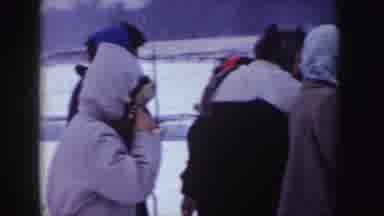 Idaho (1955): People Standing Outside In The Cold Snow And Eating Snow