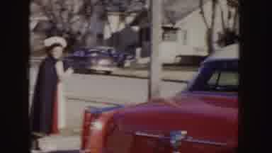 Idaho (1955): An Old Car Step Beside A Woman Walking Down The Street