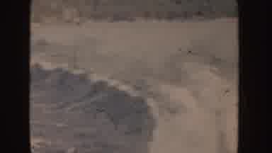 Idaho (1955): Sea With Big Waves And High Tide We Can See The Flag Of The United