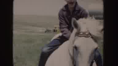 Idaho (1955): Child Riding On A Beautiful White Horse