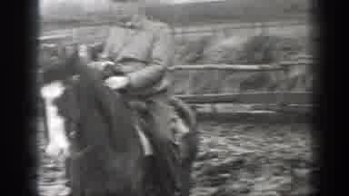 Montana (1939): Man Rides Horse With Cow On Farm In Mud