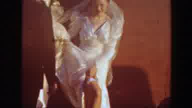 Montana (1939): Woman Wearing White Dress Shoes Blue And White Garter On Leg