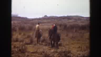 Montana (1939): Three People On Horses Riding On The Open Plains